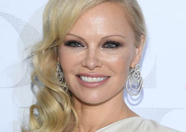 Pamela Anderson attends the 17th "Diner De La Mode" as part of Paris Fashion Week on January 22, 2019 in Paris, France. (Photo by Pascal Le Segretain/Getty Images)