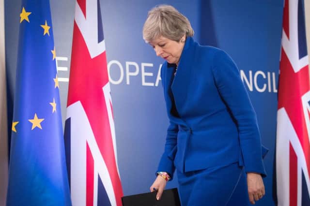 Prime Minister Theresa May at a news conference in Brussels. Photo: Stefan Rousseau/PA Wire