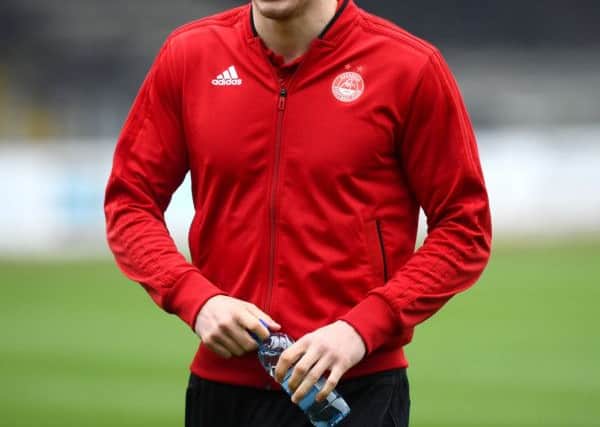 Scott McKenna will captain Aberdeen on Sunday in the absence of Graeme Shinnie. Picture: Ross Parker/SNS