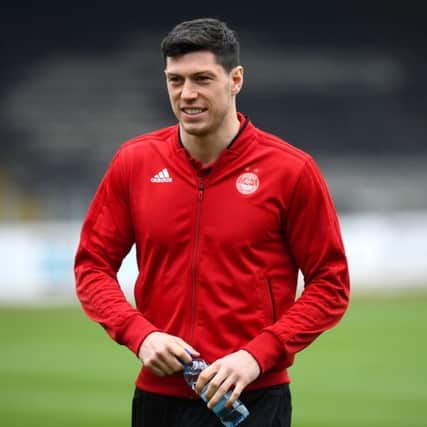 Scott McKenna will captain Aberdeen on Sunday in the absence of Graeme Shinnie. Picture: Ross Parker/SNS