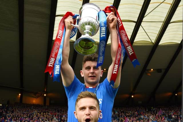 Aaron Doran (top) celebrates Inverness' 2015 Scottish Cup final win with Danny Devine. Picture: SNS