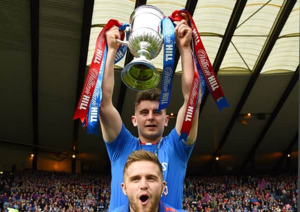 Aaron Doran (top) celebrates Inverness' 2015 Scottish Cup final win with Danny Devine. Picture: SNS