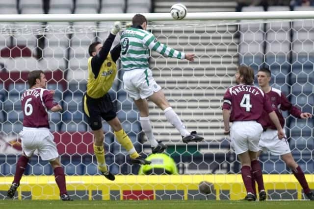 Chris Sutton heads Celtic in front in this 2005 semi-final, which Martin O'Neill's side would go on to win 2-1. Hearts fans were later criticised for booing a minute's silence for Pope John Paul II.
