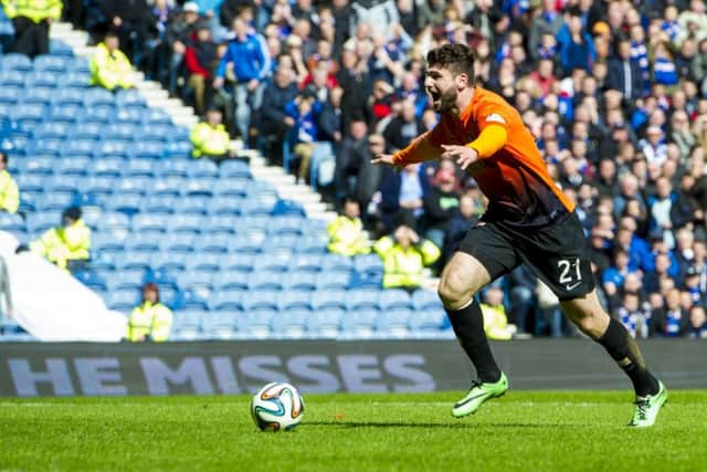 Nadir Ciftci rounds the keeper to ensure Dundee United defeat Rangers 2-1 to reach the 2014 final.
