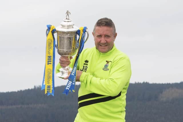 John Robertson is hoping to get his hands on the Scottish Cup for real next month. Picture: Craig Foy/SNS