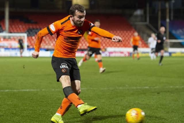Paul McMullan drives home Dundee United's second goal against Ayr. Picture: SNS