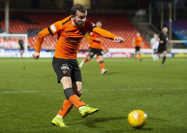 Paul McMullan drives home Dundee United's second goal against Ayr. Picture: SNS