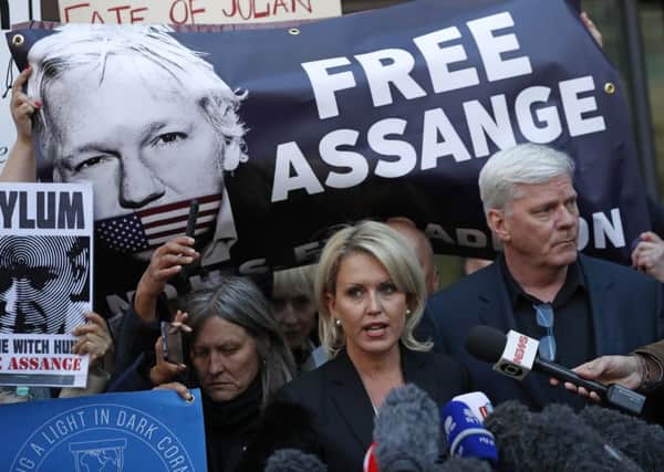 Kristinn Hrafnsson, editor of WikiLeaks, amongst demonstrators outside Westminster magistrates court. Picture: Alastair Grant/AP
