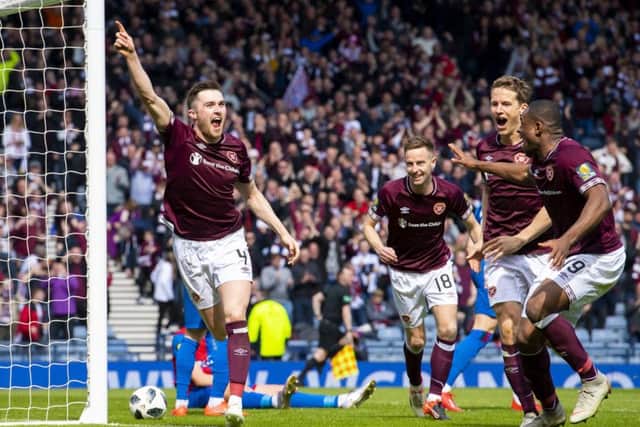 John Souttar celebrates scoring Hearts' second goal. Pic: SNS/Alan Harvey