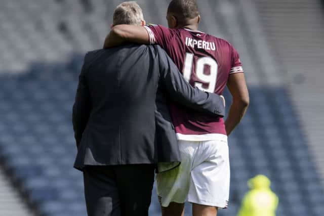 Hearts manager Craig Levein with Uche Ikpeazu at full time. Pic: SNS/Craig Foy
