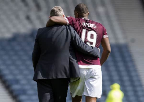 Hearts manager Craig Levein with Uche Ikpeazu at full time. Pic: SNS/Craig Foy