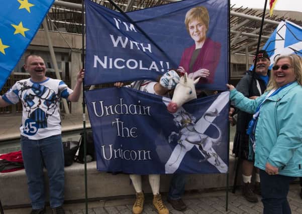 IndyRef 2 campaigners outside the Scottish Parliament. Picture: Andrew O'Brian