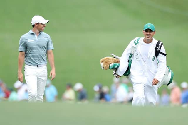 Rory McIlroy walks with caddie Harry Diamond during the third round at Augusta National. Picture: Getty Images