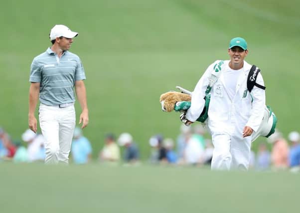 Rory McIlroy walks with caddie Harry Diamond during the third round at Augusta National. Picture: Getty Images