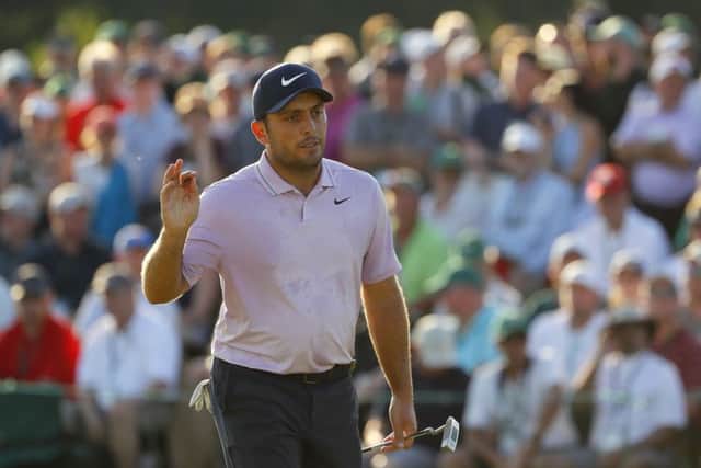Francesco Molinari acknowledges patrons during the third round of The Masters. Picture: Getty Images