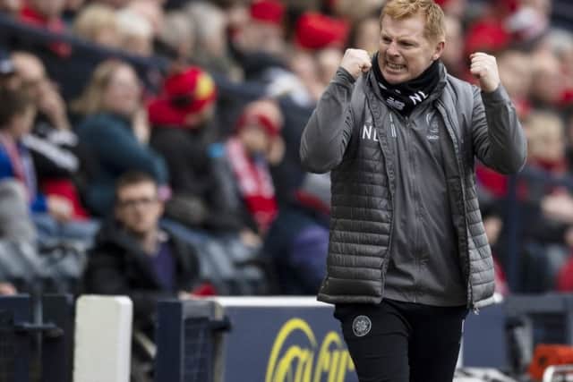Celtic manager Neil Lennon celebrates after his side go 2-0 up in the Scottish Cup semi-final. Picture: SNS