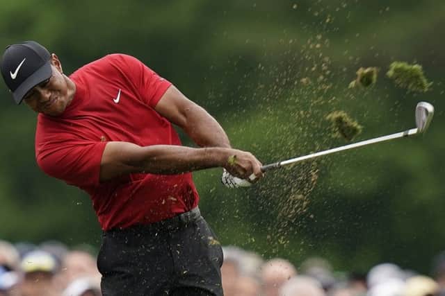 Tiger Woods in full flow on his way to a fifth Masters victory at Augusta National. Picture: AP