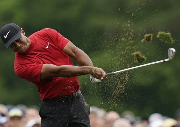 Tiger Woods in full flow on his way to a fifth Masters victory at Augusta National. Picture: AP