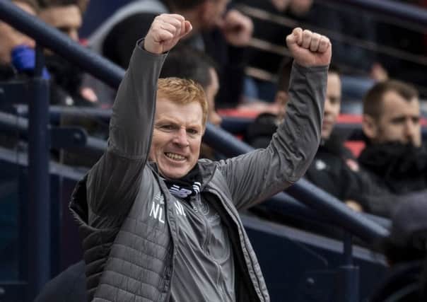 Celtic manager Neil Lennon celebrates after the second goal against Aberdeen. Picture: SNS