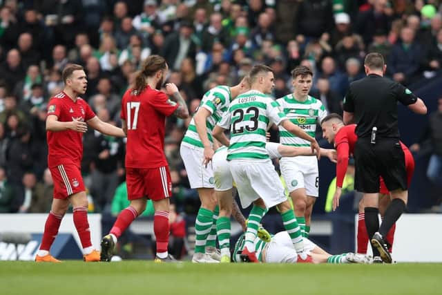 Ryan Christie of Celtic lies injured after a clash with Dominic Ball during the Scottish Cup semi-final. Picture: Getty