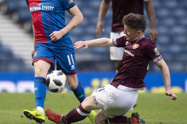 Bobby Burns puts in a challenge during Hearts' Scottish Cup semi-final victory over Inverness Caley Thistle. Picture: SNS.