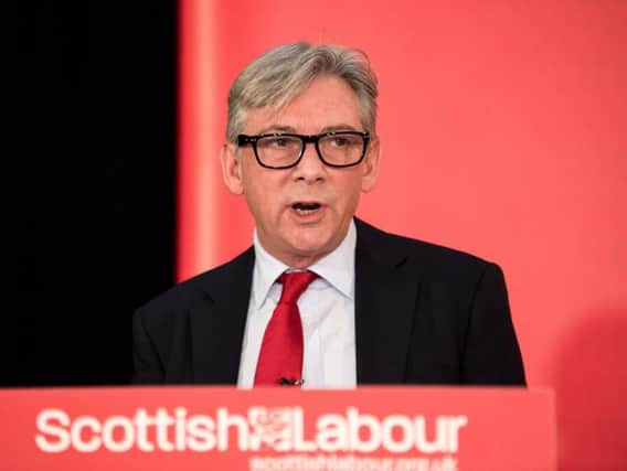 Scottish Labour leader Richard Leonard has said he would make the real living wage and trade union rights compulsory for the awarding of public contracts.