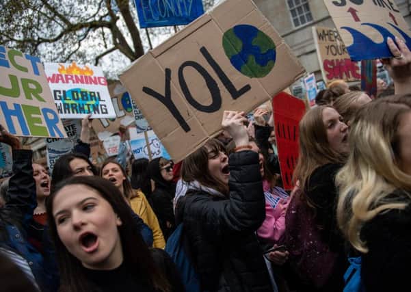 Young people take part in a YouthStrike4Climate protest. In some parts of the world, that can be a deadly business (Picture: Chris J Ratcliffe/Getty Images)