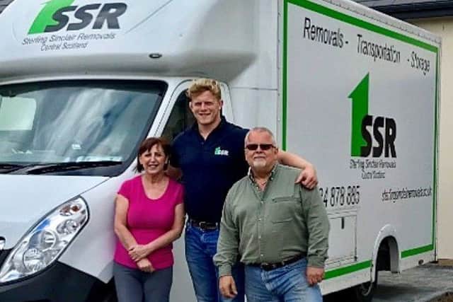 Business-owner Neil Adam Sinclair (centre). Picture: contributed.