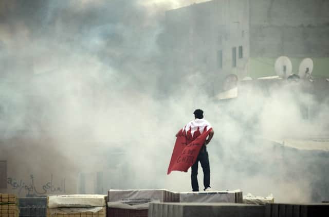 Bahraini demonstrator (Photo by - / AFP)-/AFP/Getty Images