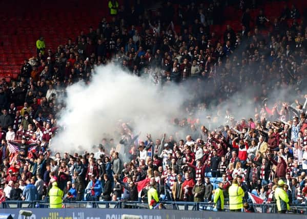 Pyrotechnic devices were set off at the semi-final match at Hampden. Picture: SNS Group
