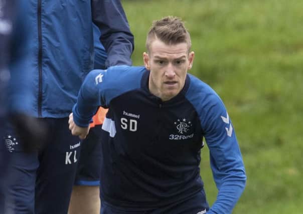 Steven Davis has had an indifferent few months at Ibroxbut his former coach still rates him hightly. Picture: SNS.