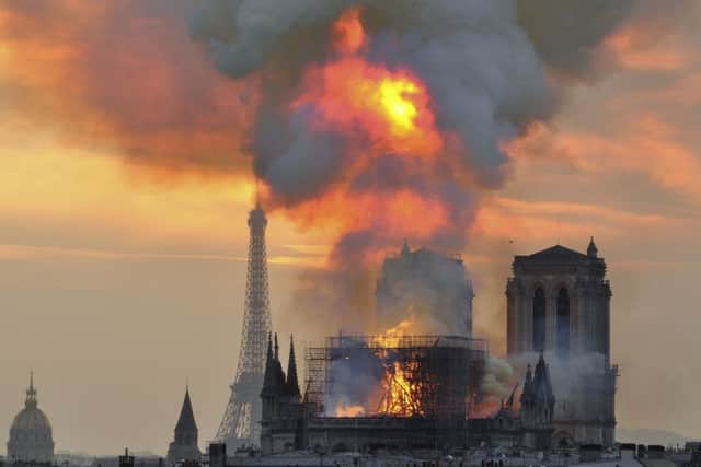 Visitor numbers have risen sharply at Britain's smallest cathedral following this week's devastating blaze at Notre Dame in Paris. Picture: AP Photo/Thierry Mallet