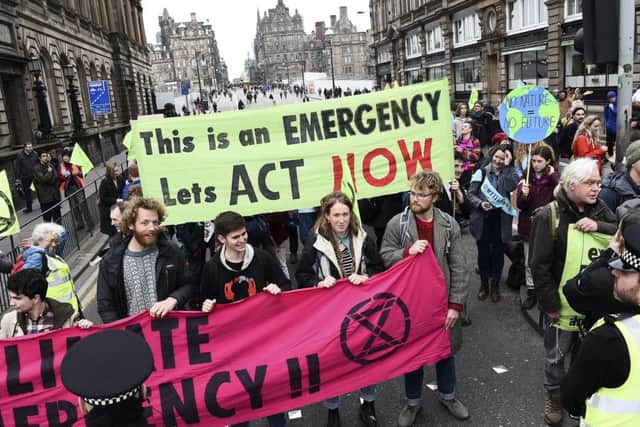 Extinction Rebellion protesters halt traffic in Edinburgh (Picture: Lisa Ferguson)