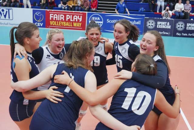 City of Edinburgh celebrate winning the U18 Girls Scottish Cup (pic courtesy of Michael McConville & Lynne Marshall, www.volleyballphotos.co.uk).