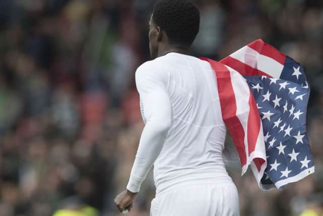 Timothy Weah flies the American flag after Celtic's win over Aberdeen in the Scottish Cup semi-final.