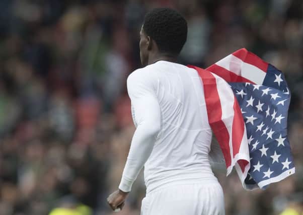 Timothy Weah flies the American flag after Celtic's win over Aberdeen in the Scottish Cup semi-final.