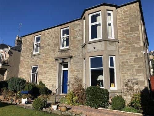 This guest house, which boasts seven bedrooms, three bathrooms and two reception rooms is on the market for offers over GBP400,000. New owners can continue to run as a business or renovate into a spacious family home.