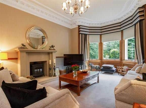 The lounge is formal and has a feature gas fire.