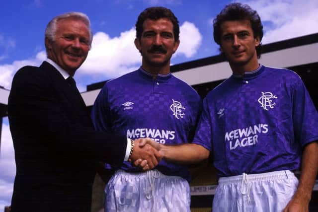 Trevor Francis is welcomed to Rangers by Ibrox by chairman David Holmes and player/manager Graeme Souness. Picture: Gareth R Reid