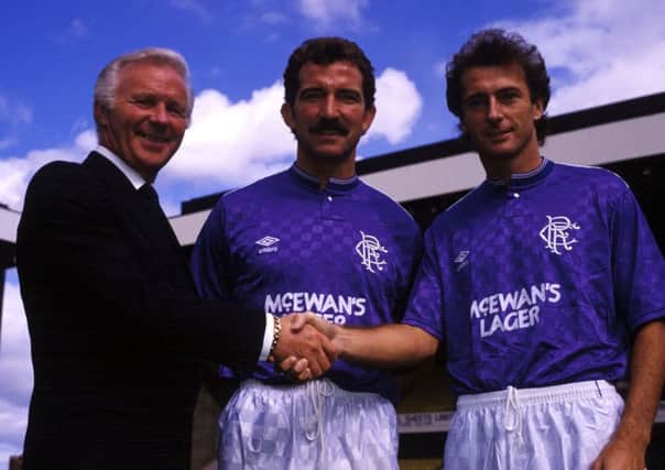 Trevor Francis is welcomed to Rangers by Ibrox by chairman David Holmes and player/manager Graeme Souness. Picture: Gareth R Reid