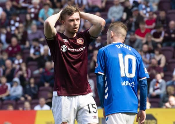 Hearts' Craig Wighton is dejected after the defeat to Rangers. Pic: SNS/Alan Harvey
