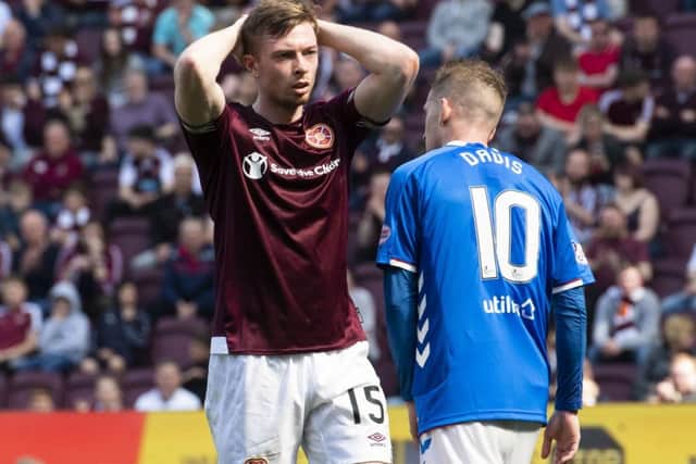 Hearts' Craig Wighton is dejected after the defeat to Rangers. Pic: SNS/Alan Harvey