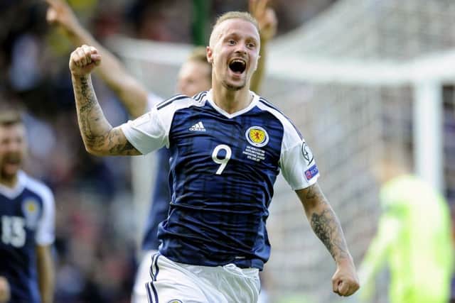 Leigh Griffiths celebrates for Scotland after scoring against England. Pic: Michael Gillen