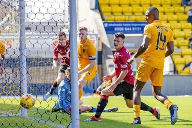 St Mirren's Paul McGinn scores an equaliser. Pic: SNS/Roddy Scott