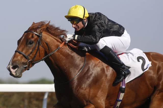 Agrotera ridden by Gerald Mosse lead the field home to win The Racing TV Snowdrop Fillies' Stakes Race run at Kempton Park Racecourse. Pic: Julian Herbert/PA