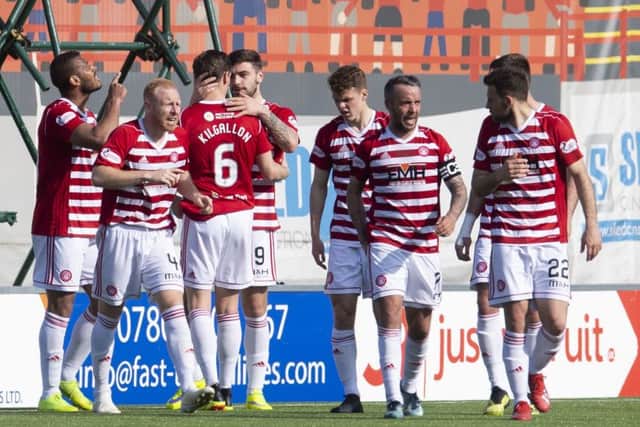 Hamilton players celebrate Marios Ogkmpoe's equaliser. Pic: SNS/Craig Foy