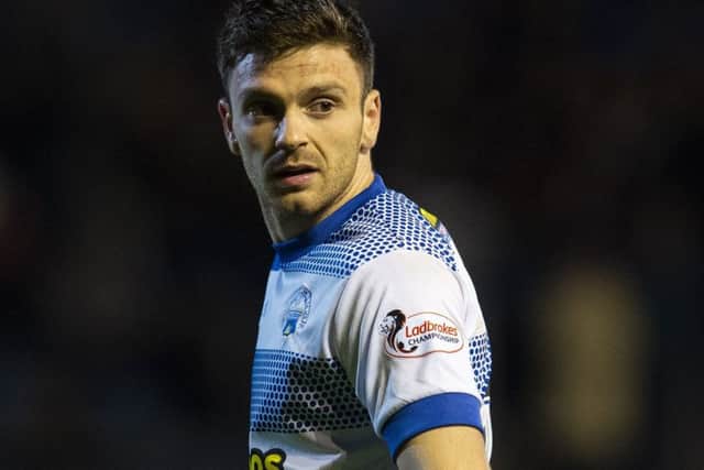 Greg Kiltie in action for Morton. Pic: SNS/Ross MacDonald