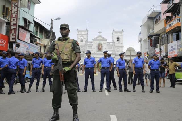 Sri Lankan Army soldiers secure the area around St. Anthony's Shrine after a blast in Colombo, Sri Lanka, Sunday, April 21, 2019.  (AP Photo/Eranga Jayawardena)
