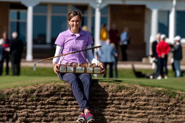 Slovenia's Pia Babnik poses with the Helen Holm Trophy after her victory at Royal Troon. Picture: Scottish Golf