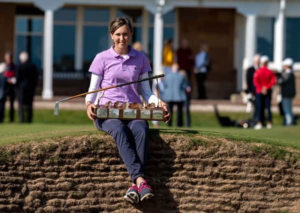 Slovenia's Pia Babnik poses with the Helen Holm Trophy after her victory at Royal Troon. Picture: Scottish Golf